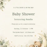 Sleeping teddy bear on a gold crescent moon with sage leaves and baby shower invitation text